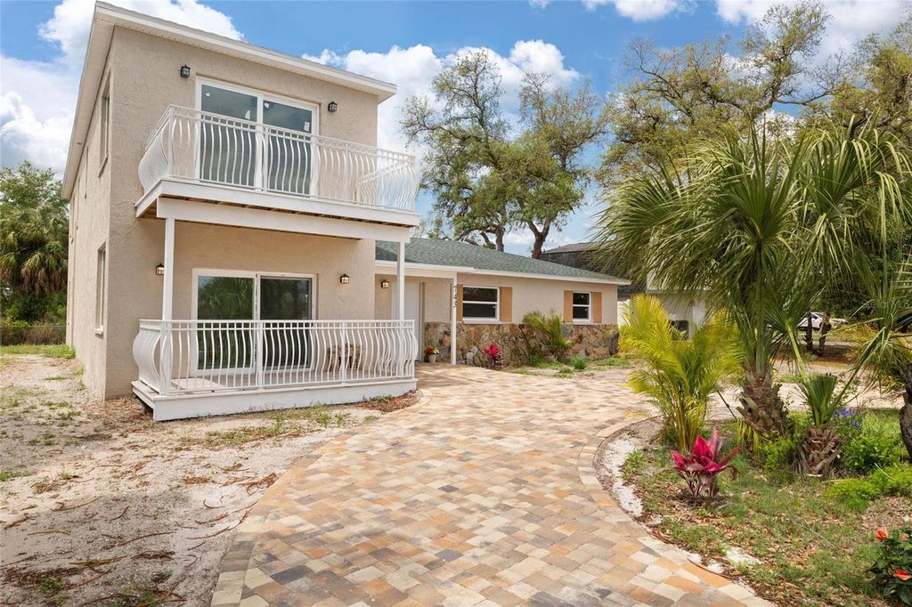 Photo of 743 Bayshore Drive, Tarpon Springs, FL 34689 (MLS # W7884829)