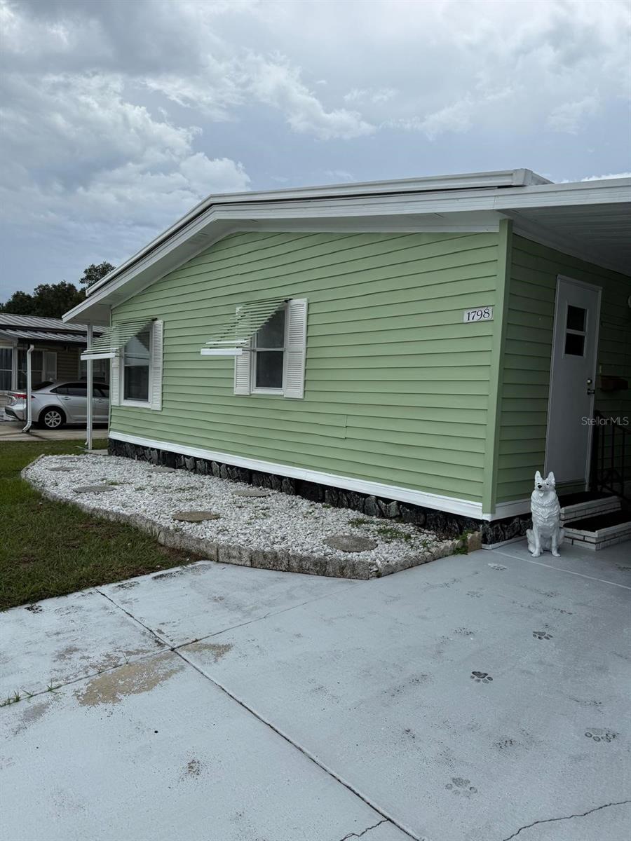 SELLER IS MOTIVATED!! ABSOLUTELY ADOREABLE 3 Bedroom, 2 Bathroom home in the 55+ community of Foxwood Lake Estates where you OWN THE LAND!! This home has lots of room for family and guests with a split bedroom plan, a metal roof over, lots of natural light including a skylight, spacious Florida Room with newly replaced windows to enjoy your morning coffee and watch the sunrise! A privacy block wall in the back yard means no rear neighbors! You'll love the open floor plan and all that home. Large Clubhouse – Heated Pool – Outdoor Covered Spa – Indoor Sauna – Health Fitness Center – 12 Lighted Covered Shuffle Courts – 2 Billiard Tables – Bowling League – Golf League – Horseshoes – Bingo – Cards – Crafts – Library – Monthly Newspaper – Lake Stocked With Fish – Lake Walking Path – Painting Class – Floor Exercises – Variety Shows – Travel Coordinator – Pot Luck Dinners – Pancake Breakfasts – Dances – Computer Club – Bible Study Classes – Line Dancing – Walking or Golf Cart Riding Distance To Sam’s Club – Flea Market and Garage sales twice a year. Perfectly located in Lakeland Florida halfway between Tampa and Orlando, this home offers easy access to Interstate I-4 and is a short drive to popular attractions such as Disney, Universal Studios, Busch Gardens, Lowry Park Zoo, Hard Rock Casino and beautiful beaches! Tampa and Orlando airports are also within a 1-hour drive, great place to call home - schedule your showing today!