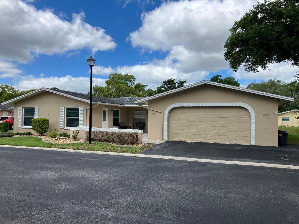 Photo of 12009 Boynton Lane #19BG, New Port Richey, FL 34654 (MLS # W7884682)