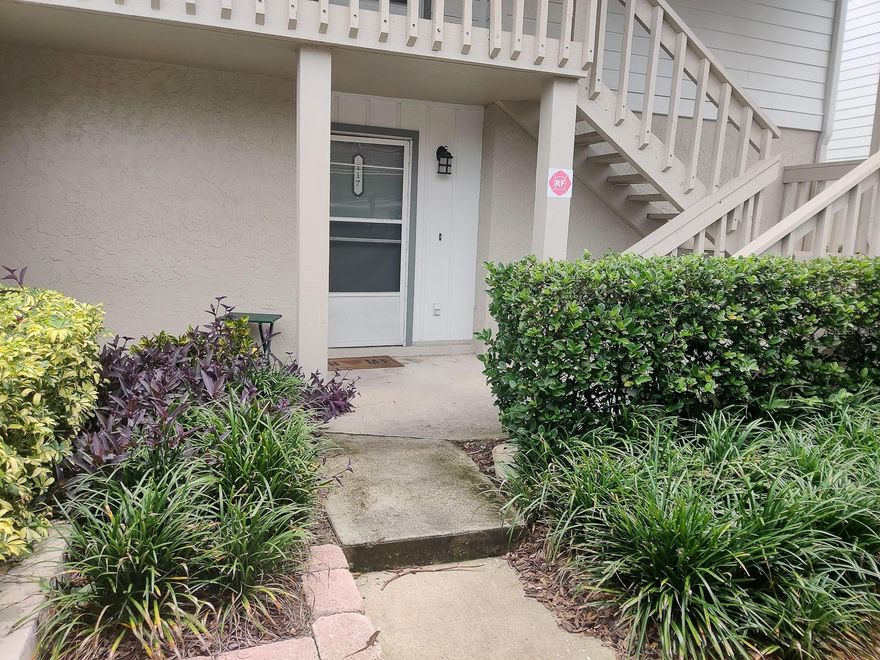 Welcome to Crown Point by the Springs in desirable Longwood. This charming ground-floor one-bedroom, one-bath condominium offers comfortable living in a well-maintained and quaint community.

The spacious living room features sliding glass doors that open to a private rear patio, creating an inviting indoor-outdoor living space perfect for relaxing or entertaining. The generously sized bedroom includes a walk-in closet and overlooks mature landscaping, providing a peaceful and serene retreat.

Additional highlights include an interior utility room with a full-size washer and dryer, a large open front porch, and exterior storage for added convenience. The unit also includes a one-car carport and one assigned parking space.

The HOA covers water, exterior maintenance, and grounds care, and residents enjoy access to the community pool and clubhouse.

Ideally located in Longwood close to grocery stores, restaurants, and everyday amenities, with I-4 less than one mile away. Cranes Roost Park and Altamonte Mall are just three miles away, Winter Park Village is approximately eight miles away, and downtown Orlando is only eleven miles away.

This is a great opportunity to own a low-maintenance home in a prime location. Photos are of the unit prior to the current tenant’s occupancy.