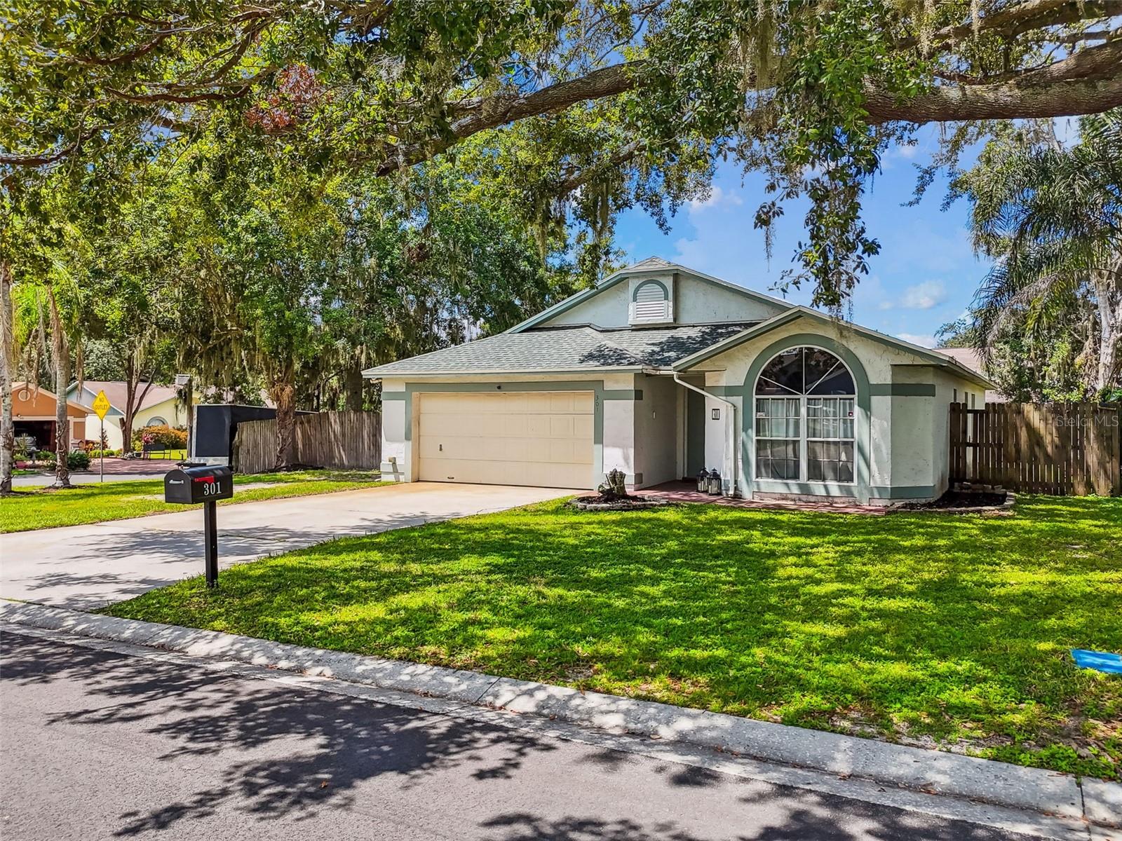 Fall in love with this warm and welcoming three-bedroom, two-bathroom home on a desirable corner lot in the Sugar Creek community! Thoughtfully updated with a new roof (2024) and new AC (2021), this home blends peace of mind with everyday comfort. Designed with a split floor plan, the spacious primary bedroom feels like its own retreat! Newer flooring throughout the home adds a fresh feel; the updated kitchen with modern appliances makes cooking a joy, while the spacious layout flows beautifully for both relaxing and entertaining. Step outside to your private backyard oasis — complete with a chicken coop; it’s perfect for planting a garden, creating a play space, or simply enjoying quiet evenings. With no HOA and move-in readiness, this home is truly a wonderful place to put down roots. This home is ready and waiting for you! Call today for your own private showing!