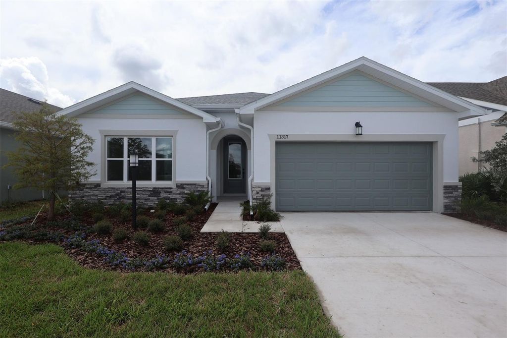 Photo of 11317 Hardwood Hammock Lane, Riverview, FL 33569 (MLS # TB8460990)