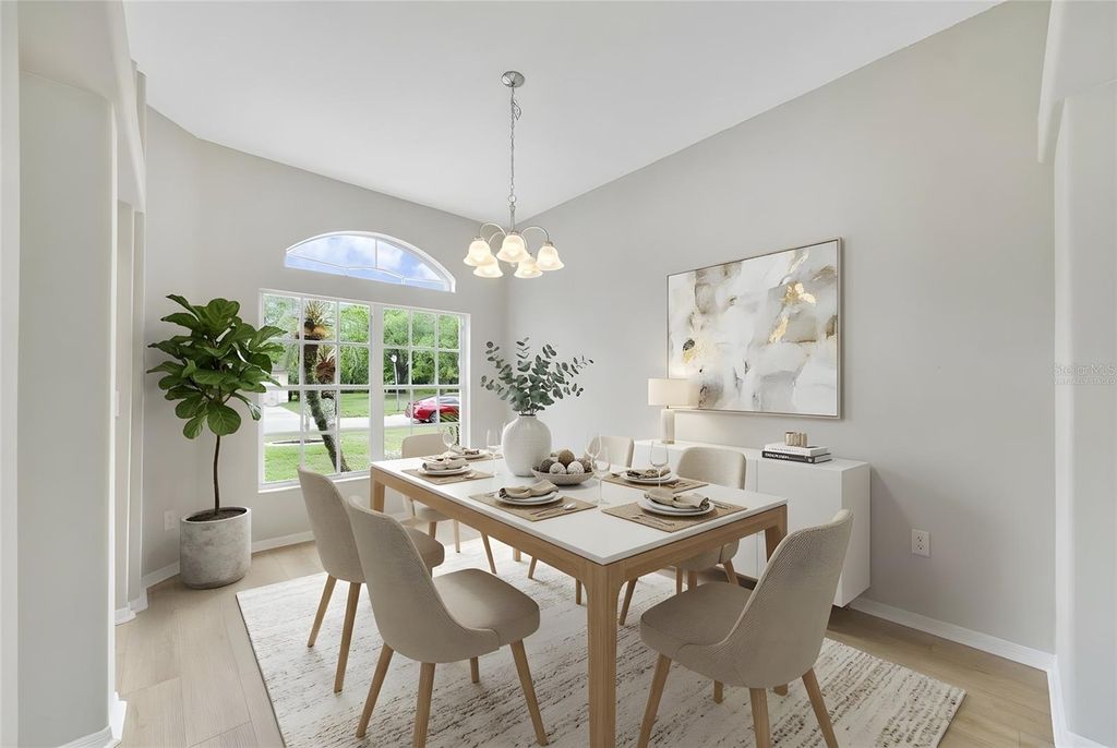 Photo of 13850 Riverpath Grove Drive, Orlando, FL 32826 (MLS # O6394875)