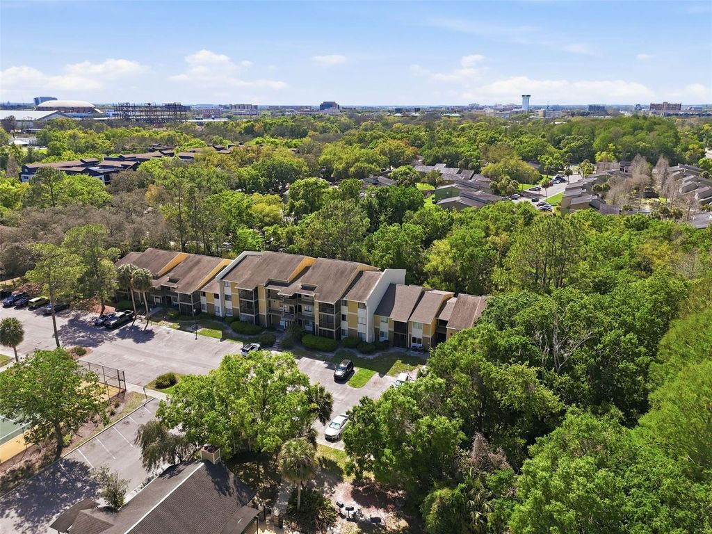 Photo of 13285 Arbor Pointe Circle #202, Tampa, FL 33617 (MLS # TB8487175)