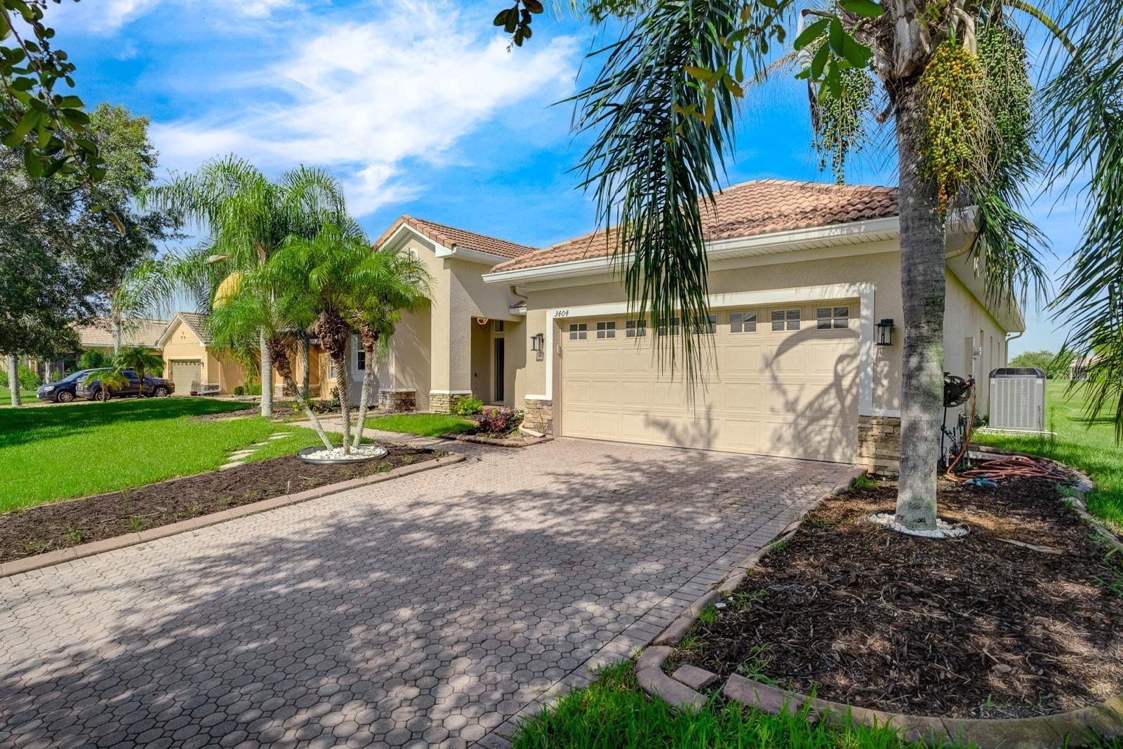 MOVE-IN READY - Step into this beautifully spacious updated 4-bedroom, 2-bath home that perfectly blends comfort, style, and functionality. The heart of this home is the fully remodeled kitchen, featuring sleek quartz countertops, custom soft close cabinetry, stainless steel appliances, and a spacious - counter height - island perfect for meal prep or casual dining along with a coffee station/pantry multi-purpose custom cabinet. Both bathrooms have been tastefully renovated with modern finishes, including updated vanities, and contemporary fixtures, offering a spa-like retreat for relaxation. The newer A/C unit is high performance with the UV light to help prevent mold. The home offers generous living space with the formal living and dining room and a bright and open floor plan in the family room, fresh interior paint, and upgraded wood flooring throughout. Outside, enjoy a low-maintenance yard and screened in patio ideal for entertaining or relaxing evenings looking out to your own large pond view. Conveniently located near schools, parks, and shopping, this move-in-ready home offers both charm and modern amenities. Bellalago is a gated oasis with a resort lifestyle. Enjoy the multiple pools, fitness centers, the Bellalago Grill restaurant and access to Lake Toho with a community boat lift, boat launch and a fishing pier. Basic cable TV and landscape irrigation is included in the HOA fees.