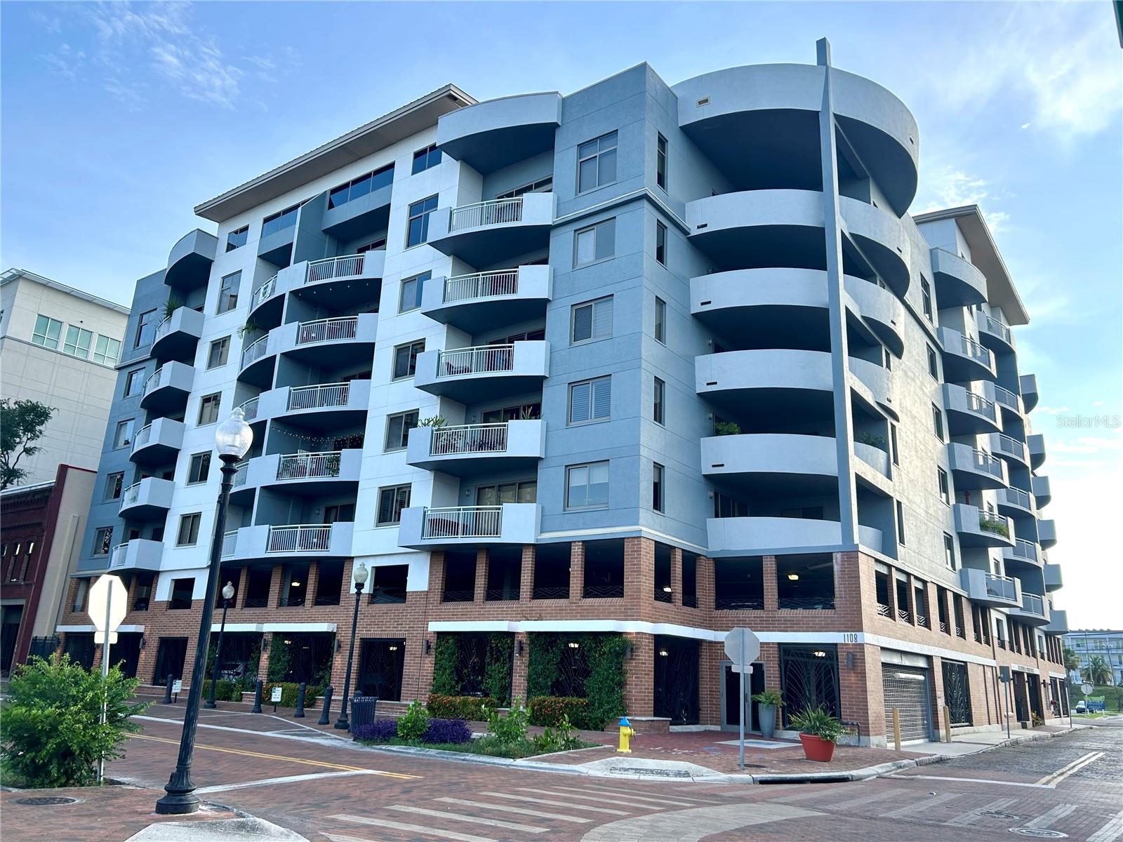 Spacious Corner-Unit Condo in the Heart of Downtown Tampa! This beautifully maintained residence features two private balconies, a fully renovated bathroom (2024), upgraded appliances, and a large laundry room with ample storage. The expansive primary suite includes a walk-in closet with custom built-ins. Enjoy stunning rooftop amenities including a clubhouse, fitness center, and a resort-style pool with jets offering panoramic city views. Assigned parking in a secured garage, call box access, and available bike room and private storage cage ensure both convenience and peace of mind. Located just steps from Tampa’s premier attractions — STRAZ Center (0.3 mi), Tampa Theatre (0.3 mi), Riverwalk (0.3 mi), Armature Works (0.7 mi), Water Street (1.1 mi), and Sparkman Wharf (1.3 mi) — this condo offers a true urban oasis in one of Tampa’s most desirable neighborhoods. Live where culture, cuisine, and city life converge!