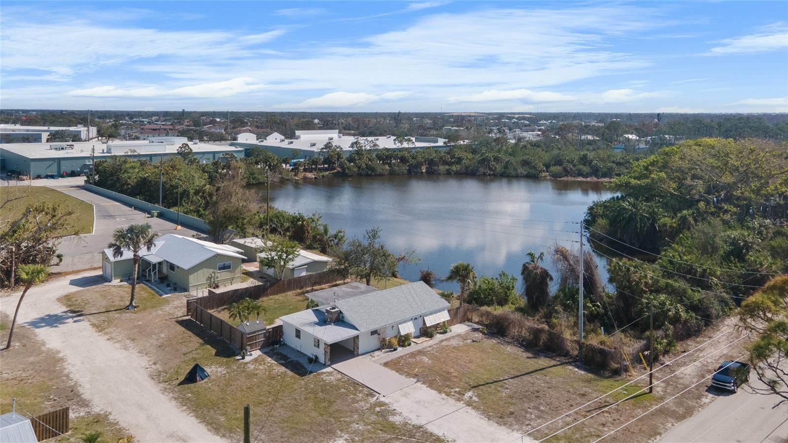 Double the value, double the income! Don’t miss this rare opportunity to own two income-producing homes on one property—just 2 miles from stunning Englewood Beach! Whether you’re looking to live in one and rent out the other, as the current owner does, or you want to expand your rental portfolio with two cash-flowing properties, the possibilities here are endless. One of the homes comes fully furnished and has a proven Airbnb rental history, making it a turnkey opportunity for immediate income.
***The first residence is a charming 3-bedroom, 2-bathroom home offering serene water views of a peaceful pond. Inside, you’ll find stylish laminate flooring and a spacious Florida room that can be used for lounging, entertaining, or even as a second living space. The chic Bahama shutters add to the home’s inviting coastal style, while a fully fenced backyard provides privacy and plenty of space for outdoor fun. A covered carport offers protection for your vehicle, and with the home coming fully furnished and rental-ready, it’s a perfect fit for investors or seasonal residents alike.
~~~The second home features 2 bedrooms, 2 bathrooms, and is equally impressive with a durable metal roof, an attached garage, a detached garage, and a shed for additional storage or workspace. Luxury vinyl plank flooring runs throughout most of the home, giving it a modern and low-maintenance appeal. The kitchen is a highlight, featuring stainless steel appliances and an elegant tray ceiling that adds architectural interest. The spacious primary suite includes an en-suite bathroom with granite countertops and a walk-in closet, offering both style and function. Enjoy beautiful water views from the Florida room or step outside to relax in the peaceful surroundings.
***Both homes are equipped with their own laundry areas and separate septic systems. However, public sewer water is available, and all connection fees have been fully paid, giving you flexibility and long-term value.
~~~Located in the heart of Englewood, this property puts you close to everything you need. You’ll enjoy easy access to local shops, restaurants, farmers markets, concerts, and countless recreational activities. Spend your days beachcombing at Englewood or Manasota Beaches, teeing off at nearby golf courses, or experiencing world-class boating and fishing. With two Major League Baseball Spring Training stadiums also in the area, the entertainment options are endless.
***Whether you're seeking a personal coastal escape or a high-performing investment property, this is a unique opportunity to start earning income from day one. Call now to schedule a private showing and secure your piece of paradise!