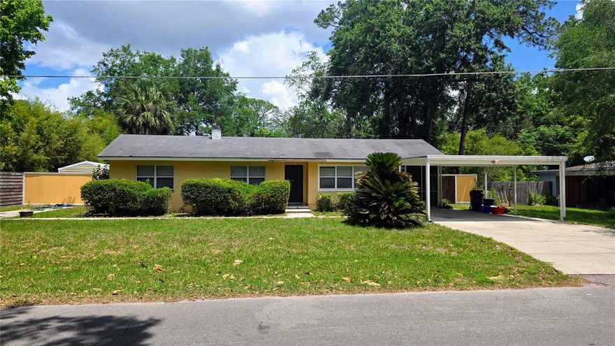 Charming updated ranch-style home in one of NE Gainesville’s most popular neighborhoods! This 3 bedroom, 2 bath home offers the perfect blend of character, flexibility, and location — all within walking distance to Public & General and an easy bike ride to downtown Gainesville. The seller is including a BRAND-NEW ROOF with an acceptable offer, adding major value and peace of mind for the next owner.

Inside, you’ll find an updated kitchen and renovated bathrooms, recent double pane windows, along with a flexible 4th bedroom/flex space featuring its own private entrance and screened porch — ideal for a home office, guest suite, studio, or bonus room. Outside, the expansive yard is packed with possibilities, offering multiple outbuildings and storage spaces, including one with power, plus a large covered and enclosed patio perfect for hobbies, entertaining, exercise/yoga space or greenhouse.

With room to spread out, endless storage, and a prime location near all the restaurants, parks, and attractions that make NE Gainesville so popular, this unique property offers opportunity, convenience, and charm all in one package.