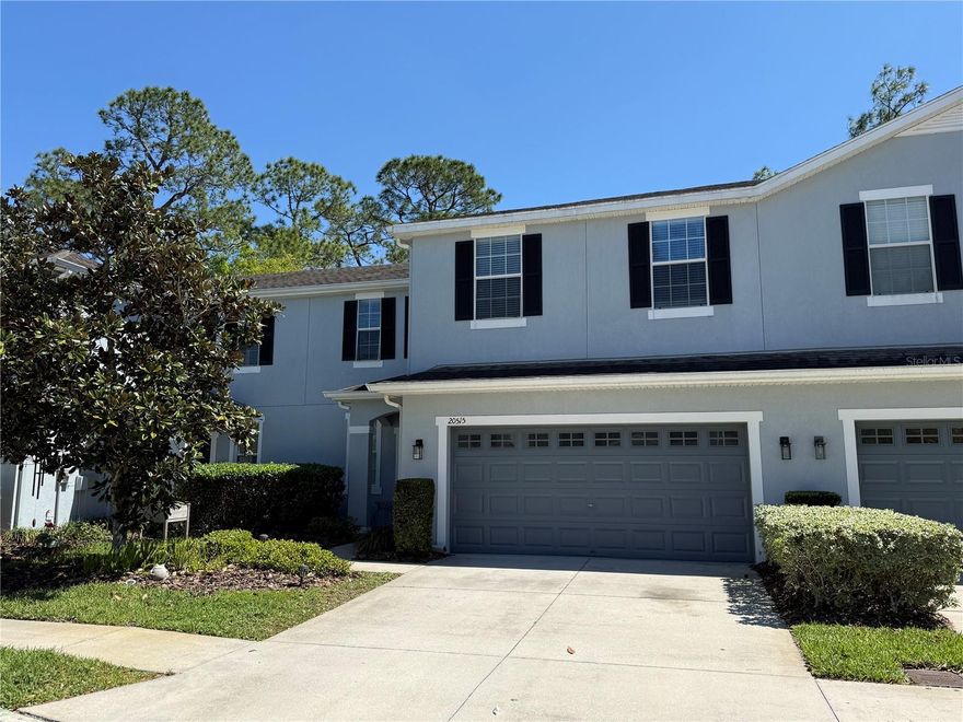 Spacious 3 bedroom, 2 bathroom, 2 car garage home with a bonus room, loft, and oversized screened-in lanai overlooking conservation in the sought-after gated community of Grand Hampton. This home offers a great layout with all bedrooms located upstairs, along with a versatile loft space perfect for a second living area, office, or playroom. Inside, you’ll find wood flooring throughout the main living areas and brand new carpet in the bedrooms for a fresh, comfortable feel. The oversized screened lanai gives you the perfect place to relax and enjoy peaceful conservation views. Located in Grand Hampton, residents enjoy a gated community setting with convenient access to shopping, dining, and major roadways.