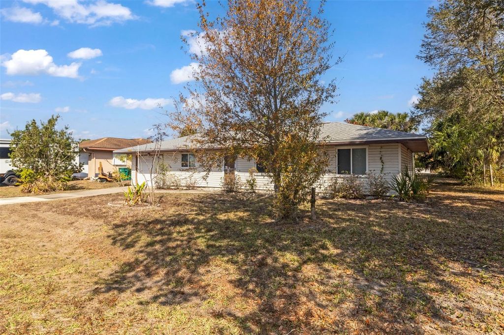 Photo of 21070 Delake Avenue, Port Charlotte, FL 33954 (MLS # O6387149)