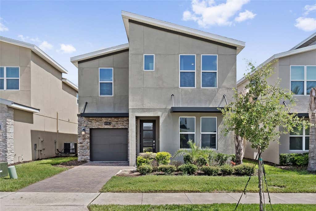 Photo of 8983 Backswing Way, Davenport, FL 33896 (MLS # O6427382)