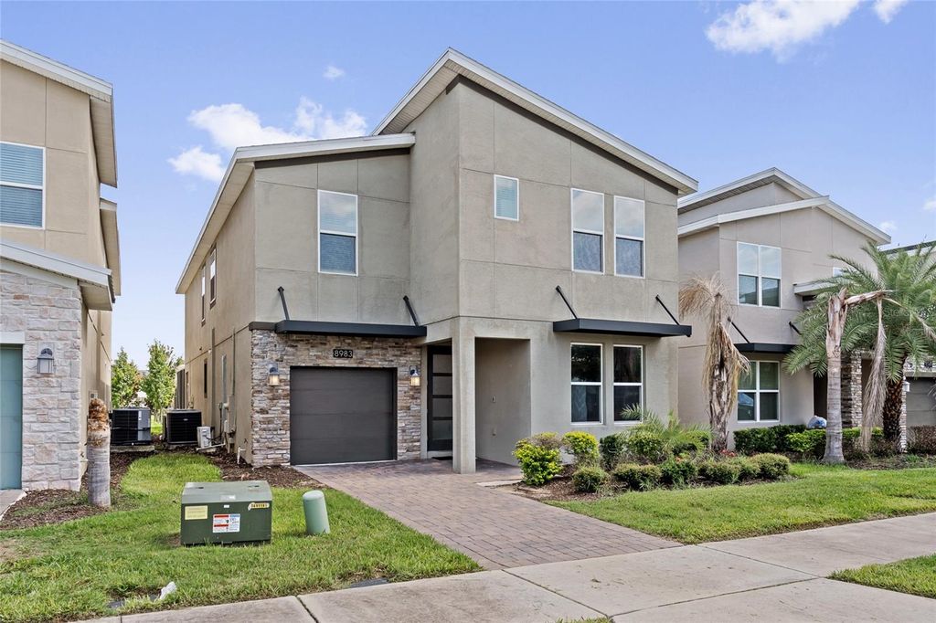 Photo of 8983 Backswing Way, Davenport, FL 33896 (MLS # O6427382)