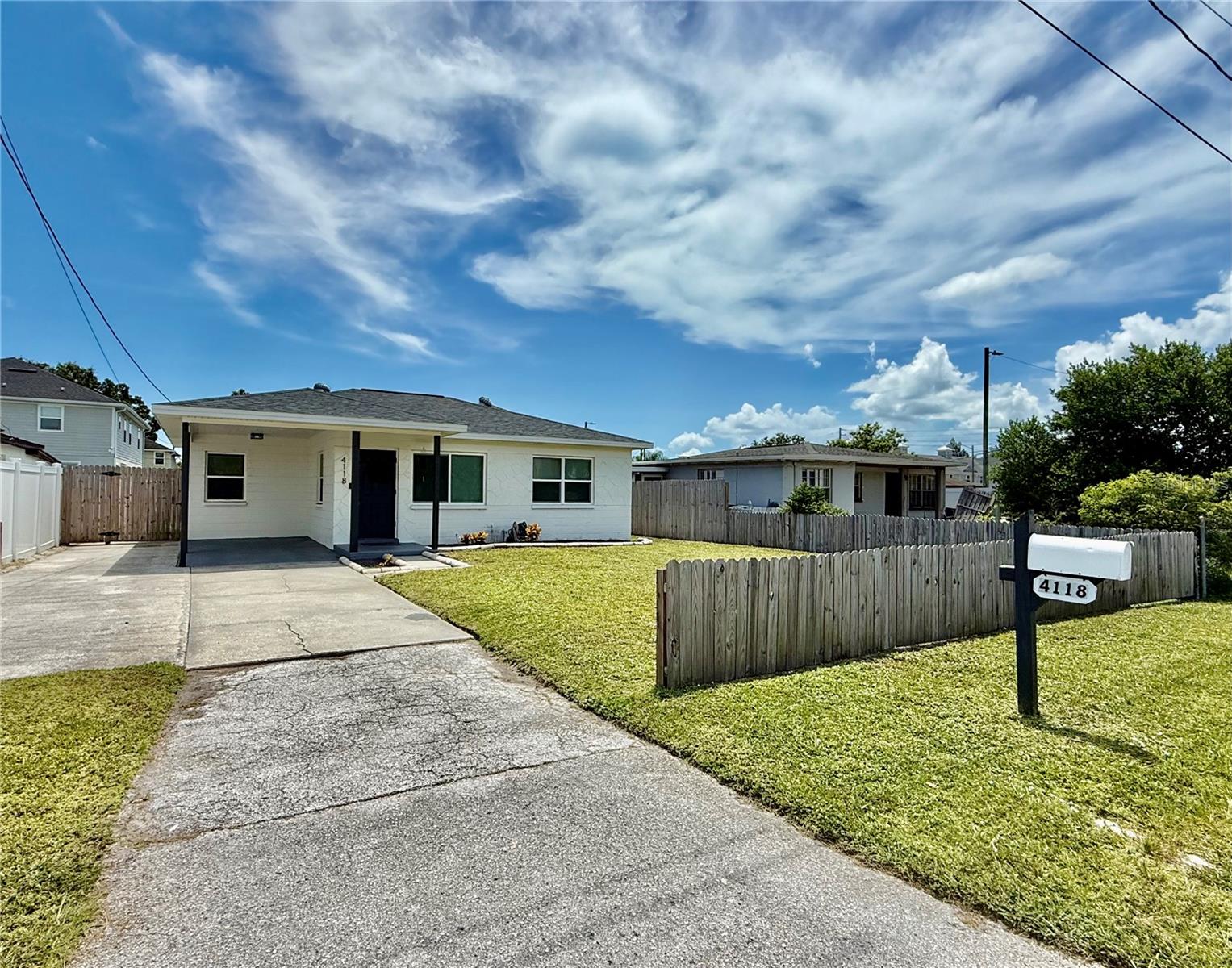 Welcome to this beautifully updated 2-bedroom, 1-bath gem located in one of South Tampa's most desirable neighborhoods and on a dead end street. With an open and airy floorplan, this home offers a warm and inviting atmosphere that's perfect for both relaxing and entertaining. Step inside to find wood laminate flooring throughout, adding style and durability to every room. The spacious kitchen is a true standout featuring stainless steel appliances, sleek stone countertops, and ample cabinet space for all your storage needs. The bathroom includes a convenient shower/tub combo, and a washer and dryer are included for your everyday ease. Enjoy Florida living at its best with a large, fully fenced front and backyard perfect for pets, play, or weekend gatherings. A covered carport adds convenience and protection from the elements. Ideally located just minutes from major highways, top-rated restaurants, shopping, and entertainment. Zoned for some of Tampa's best schools: Grady Elementary, Coleman Middle, and Plant High School. Don't miss your chance to rent this South Tampa charmer its move-in ready and waiting for you! In addition to the advertised base rent, all residents are enrolled in the Resident Benefits Package (RBP) for $50.00/month which includes HVAC air filter delivery, credit building to help boost your credit score with timely rent payments, utility concierge service making utility connection a breeze during your move-in, and much more! More details upon application. Pets welcome, max 2. Vacant and Available now!