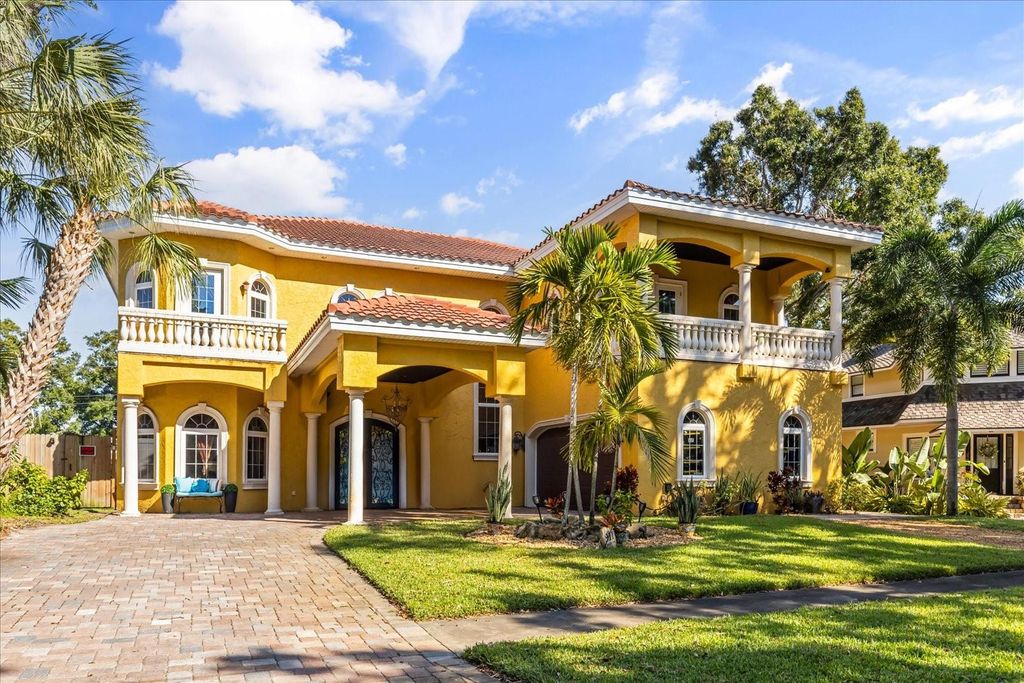 Photo of 911 Jungle Avenue N, St Petersburg, FL 33710 (MLS # O6358654)