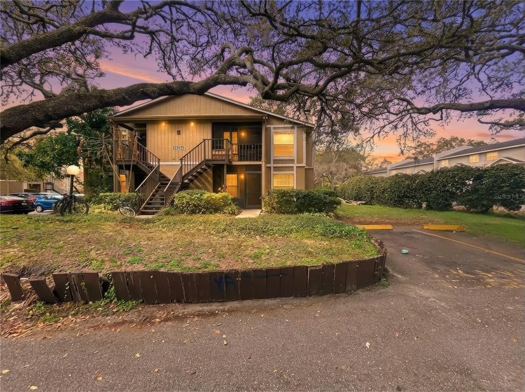 Photo of 14324 Hanging Moss Circle #101, Tampa, FL 33613 (MLS # TB8478918)