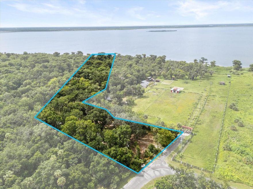 Tucked away in the hidden gem of Black Hammock in Oviedo, this 8.6-acre waterfront property on Lake Jesup offers a rare opportunity to build your dream home in a peaceful, natural setting with no HOA and endless possibilities. The property features a cozy 1-bedroom, 1-bathroom with kitchen structure—perfect as a guest house, office, or temporary living space while you design your ideal residence. Imagine launching your boat from your own custom dock, enjoying breathtaking sunsets over the lake, and soaking in the tranquil lifestyle this unique location provides. With previous electrical service already in place, reconnecting is simple. Located just minutes from 417, Oviedo on the Park, and the beloved Black Hammock Restaurant and airboat rides, you’ll also enjoy easy access to over 700 acres of nearby wilderness trails for walking, biking, or horseback riding. Whether you're looking for a private retreat, space for animals and toys, or the canvas to create a one-of-a-kind estate, this property is full of potential and natural charm. The owner has already invested in custom plans and secured a builder, offering the option to build on the land using a construction loan.