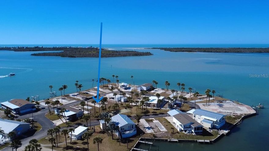 Looking for the perfect spot to kick off your shoes and drop your anchor? Welcome to your new favorite slice of Southwest Florida. Park Pointe isn't just a piece of land; it’s a golden ticket to the ultimate waterfront lifestyle in a charming, 54-unit community that’s getting a fresh start.  This is quite literally a Boater’s Paradise, with direct access to the Gulf of America via Stump Pass! Whether you're chasing the big catch, headed to the beach, or just cruising for dolphins, you’re on the water in minutes. Experience "Easy-Living" Perks with private boat docks for rent, a handy boat launch, and the holy grail of Florida living: Free boat and trailer parking! And the Views That Never Quit: This lot boasts partial southern water bay views that are staying put—even with new future homes in place—plus no neighbors behind you, just a peaceful recreation area. Park Pointe also offers extensive sunset views from its park-like picnic area adjacent to the small marina and abundant boat parking area.  Feeling hungry? The Lighthouse Grill & Tiki Bar is practically in your backyard. Imagine sunset dining, live music, and cold drinks, just a short stroll or golf cart ride away. Want your best friend or family member next door? The lot next to this one is also up for grabs. Pick your neighbors and start the ultimate coastal family compound!  Nature enthusiast? You will enjoy the variety of migratory birds flying overhead and wading along the shore, plus the dolphins and manatees swimming off the seawall. Whether you're building a cozy retreat or a permanent sunshine oasis, this is the place to be. Park Pointe is a deed-restricted approximately 10-acre community that only allows manufactured homes, with affordably low association fees. Buyers will own one share of stock in Park Pointe, Inc., a limited corporation cooperative with only 54 stockholders.  No pets allowed.  Are you the next neighbors to define Park Pointe’s new personality and enjoy the salt life to the fullest?