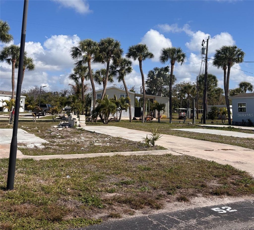 Photo of 7500 Park Pointe Drive #52, Englewood, FL 34224 (MLS # D6146548)