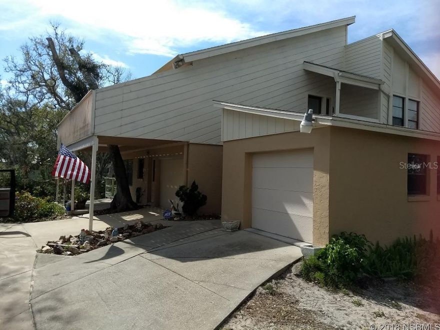 Lovely Two Story home a short .2 mile walk to public beach access. Master on lower floor. Great for Mother-in-Law. Private yard with lots of plants. New Kitchen with granite counter tops. Two, one-car garages. Walk to shopping center and Elementary school. ;Water: City