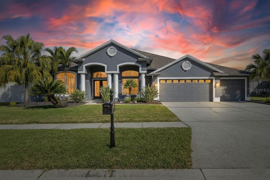 Nestled inside the gated Kingshyre community, this impeccably maintained pool home features a private screened lanai with a custom outdoor kitchen, offering an ideal setting for relaxing and entertaining. The flexible layout supports comfortable daily living and hosting gatherings, with a separate den, study, or office and a spacious living room overlooking the expansive 33’ x 34’ pool lanai. A fully retractable triple sliding glass door opens the living area to the outdoor space, creating seamless indoor-outdoor living.
At the center of the home, the spacious island kitchen overlooks the living room and serves as a natural gathering space. The home is equipped with natural gas, powering the double wall convection ovens, gas range, and water heater. The kitchen features a large wraparound breakfast bar with recessed lighting, abundant cabinetry, under cabinet lighting, and generous workspace. The kitchen cabinetry was overhauled in 2023.
The split floor plan includes an oversized fourth bedroom with an en-suite bath and direct access to the pool lanai, ideal for guests or multi-generational living. Interior features include soaring vaulted ceilings, arched doorways, and updated interior door hardware. With a fully carpet-free interior, the home offers both ease of maintenance and a clean, cohesive feel.
Recent upgrades include a remodeled primary shower completed in 2025, laminate flooring, custom closet organization, a new water heater in 2025, and a new pool pump in 2025. Additional improvements include a newer vinyl fence and fresh exterior paint.
The pool lanai offers enhanced privacy with no direct rear neighbors and mature tropical landscaping. The lanai includes a freestanding propane fire pit, and the outdoor kitchen grill is connected directly to the home’s gas line, eliminating the need for propane tank replacements when grilling. The backyard features lush grass, and a producing avocado tree!
Kingshyre offers a gated entry, low HOA fees, and no CDD fees. The home is near a recreation area with a children’s splash pad and pickleball courts, with the public library and fire department just up the road. Cross Creek Boulevard and Bruce B. Downs Boulevard provide convenient access to shopping, dining, medical offices, parks, sports complexes, and major employment centers. The home did not lose power during any of the 2024 storms.
With updated finishes, a gas-equipped kitchen, flexible living spaces, a pool and outdoor kitchen, conservation views, and mature tropical landscaping, this home delivers comfort and practicality in an established New Tampa community. Schedule your private showing today.