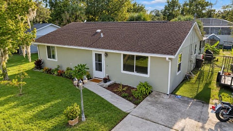 Photo of 2410 Unity Tree Drive, Edgewater, FL 32141 (MLS # V4951882)