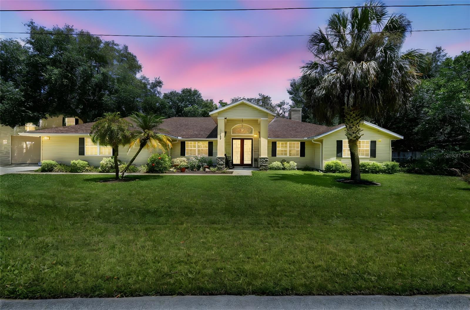Welcome to your forever home! This magnificent retreat offers the ultimate in spacious living and entertainment. This pool paradise boasts a generous 3 bedroom (easily convertible to 4), 3 bathroom main house, complete with a 3-car garage. But the luxury doesn't stop there! A detached 4-car garage features an additional 1010 sq. ft. apartment, including a bedroom, kitchen, and bathroom, perfect for guests or extended family. Need even more room? The garage area provides yet another bedroom and bathroom, making this a truly expansive property. Enjoy the elegant touch of granite throughout the home and the convenience of an inside laundry room. FIRE PLACE TOO!
Entertain in style on the large covered patio overlooking your sparkling salt water pool – ideal for gatherings of any size. Situated on just under a 1/2 acre lot with no rear neighbors, you'll appreciate the privacy and tranquility. Plus, enjoy the benefits of NO HOA/CDD fees, NO flood insurance required, NO water bills with your private well, and NO sewer bills thanks to the septic system. The detached garage also offers ample space for an RV with hookups and electric ready to go!
Conveniently located just minutes from groceries, a bus stop, schools, and Moon Lake Park with its boat ramp, you'll have everything you need within reach. Easy commutes are assured with the Suncoast Parkway close by.