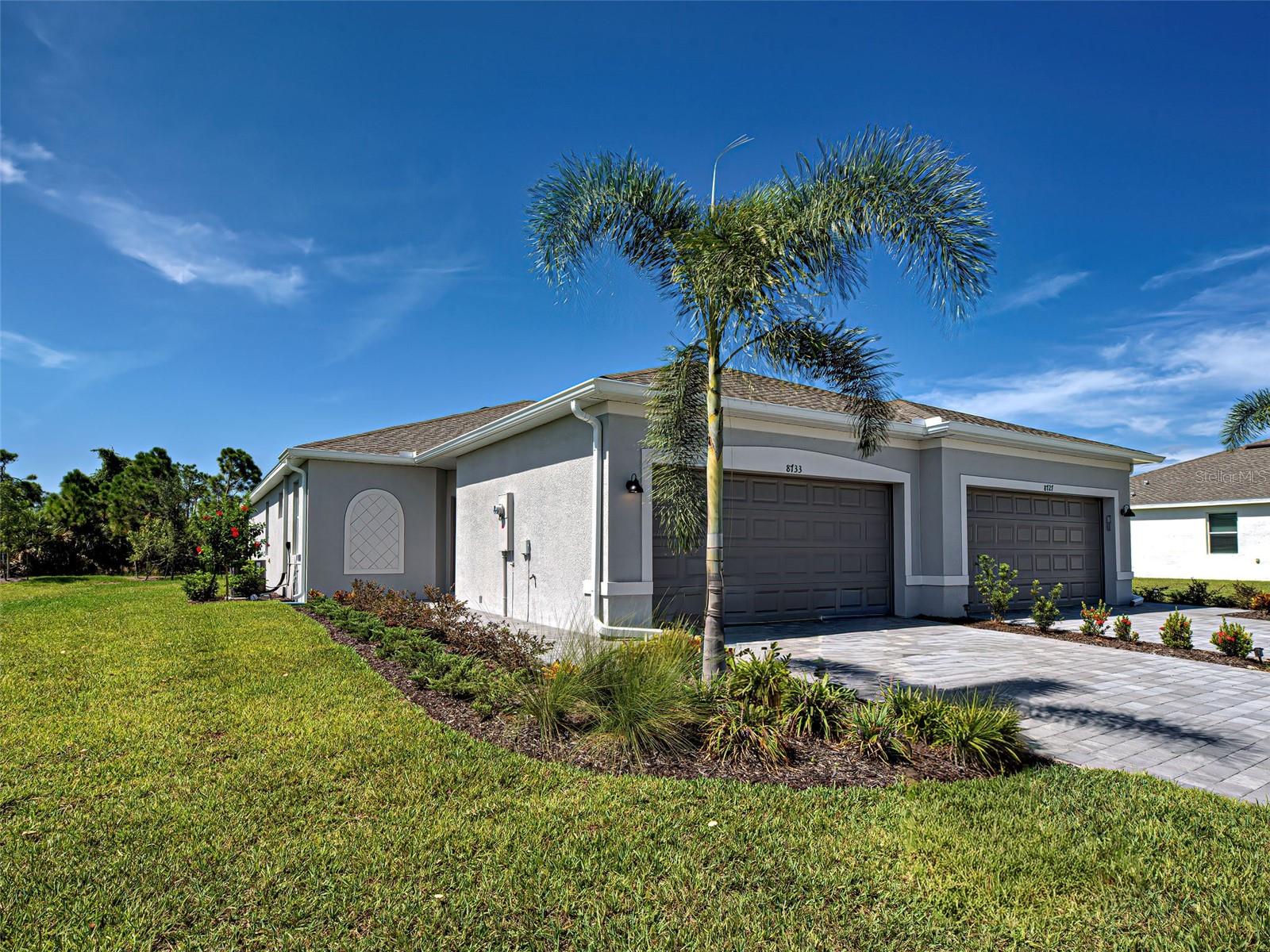 Experience the best of coastal living in this beautifully designed 3-bedroom, 2-bath villa decorated similar to the Lennar Model in Island Lakes at Coco Bay, a master-planned community in Englewood, FL. Just minutes from Englewood Beach, this single-level home features an open floor plan connecting the kitchen, dining, and living areas. The kitchen is equipped with stainless steel appliances, quartz countertops, and ample cabinet space. The private owner’s suite boasts an en-suite bathroom, while two additional bedrooms and a full bathroom are located at the front of the home. Enjoy the Florida sunshine from the outdoor lanai, and rest easy knowing the home is built with impact windows and doors for added storm protection and energy efficiency. Additional highlights include ceramic tile flooring throughout, a washer and dryer, and a two-car garage. Lawn maintenance and internet are included for a low-maintenance lifestyle. Residents enjoy access to a clubhouse, playground, resort-style pool, fitness center, and pickleball courts. Whether you're seeking a primary residence, vacation home, or investment property, this villa offers modern comfort in a desirable coastal location. Schedule your showing today!