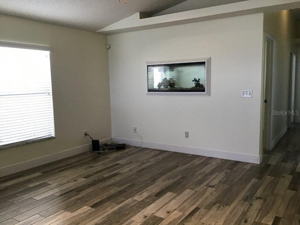 Photo of 176 Dahlia Village Circle #96, Orlando, FL 32807 (MLS # O6443062)