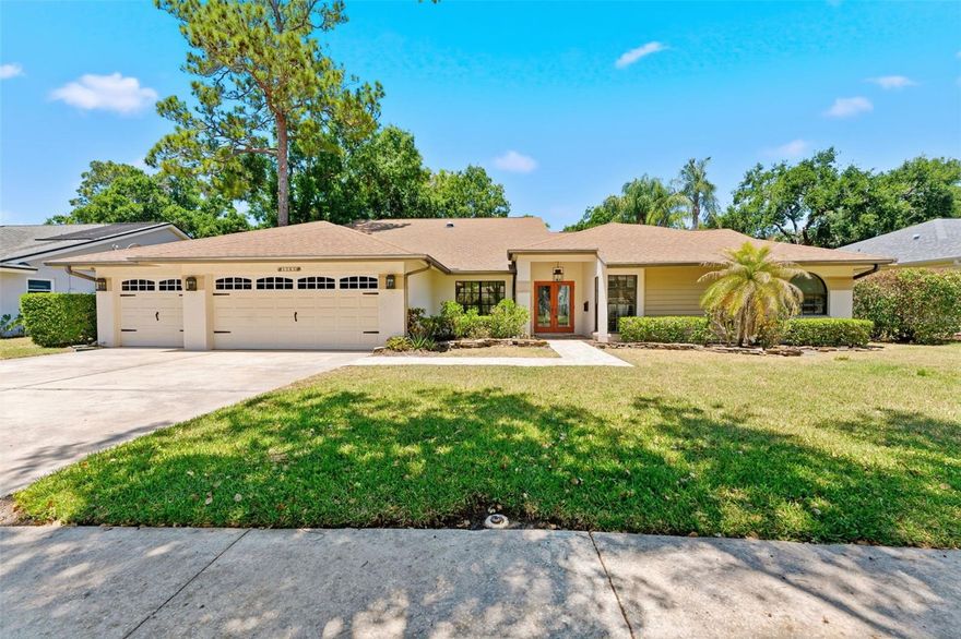 Welcome to the 18th Fairway of the Tarpon Woods Golf Course! Situated on a private lot with no rear neighbors, this triple-split floor plan offers the ideal configuration for multi-generational living. Boasting of 5 Bedrooms and 3 Bathrooms, the primary bedroom is conveniently separated from the spare bedrooms and a guest suite with it's own bathroom. Contemporary appeal welcomes you with custom stained glass entry doors and soaring vaulted ceilings. Natural light beams through the pocket sliding doors and solar tubes, creating a light and bright ambiance throughout the main living areas. The expansive open layout seamlessly connects the interior spaces with the kitchen, anchoring the heart of the home. Featuring Kraftmaid cabinetry, Maytag stainless steel appliances, generous counter space for food prep, and pull-out pantry closet drawers, this kitchen will help you keep counter clutter to a minimum. The spacious granite kitchen island doubles as the headquarters for nightly homework or friendly weekend entertaining, while the living room opens poolside via pocket sliding glass doors, blending the indoor/outdoor lifestyle we love here in Florida. A resort style primary bedroom suite includes a soaking tub, walk-in shower, a dual sink vanity and a walk-in closet. Unexpected extras include: plantation shutters, custom draperies, luxury wood plank vinyl flooring, a Murphy bed, a wood-burning fireplace, HVAC 2021, and a NEW ROOF to be installed in May 2026. Experience outdoor paradise living poolside on a sunny pavered deck with a covered patio for shade and to enjoy alfresco style summer dining. How about a temperature controlled bonus room? The 3rd stall in the garage was converted to a temperature controlled bonus room which would be great for a home gym, a workbench for the hobbyist or simply air conditioned storage. This room could easily be converted back into garage space. You'll Fall in love with this home knowing you can summer in the pool, winter on the golfing greens, and spring into the tranquility of nature. Do not delay, schedule your private showing today!