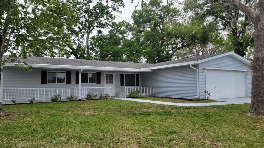 You will love this home! Completely remodeled  three bedroom, two bath with a two car garage split plan. Luxury vinyl plank floors. New refrigerator, range and dishwasher. New counter tops. Updated baths with new vanities. New AC 2019. New drain field 2018. Wired for portable generator. Low HOA fees, SECO and Marion County Utilities.