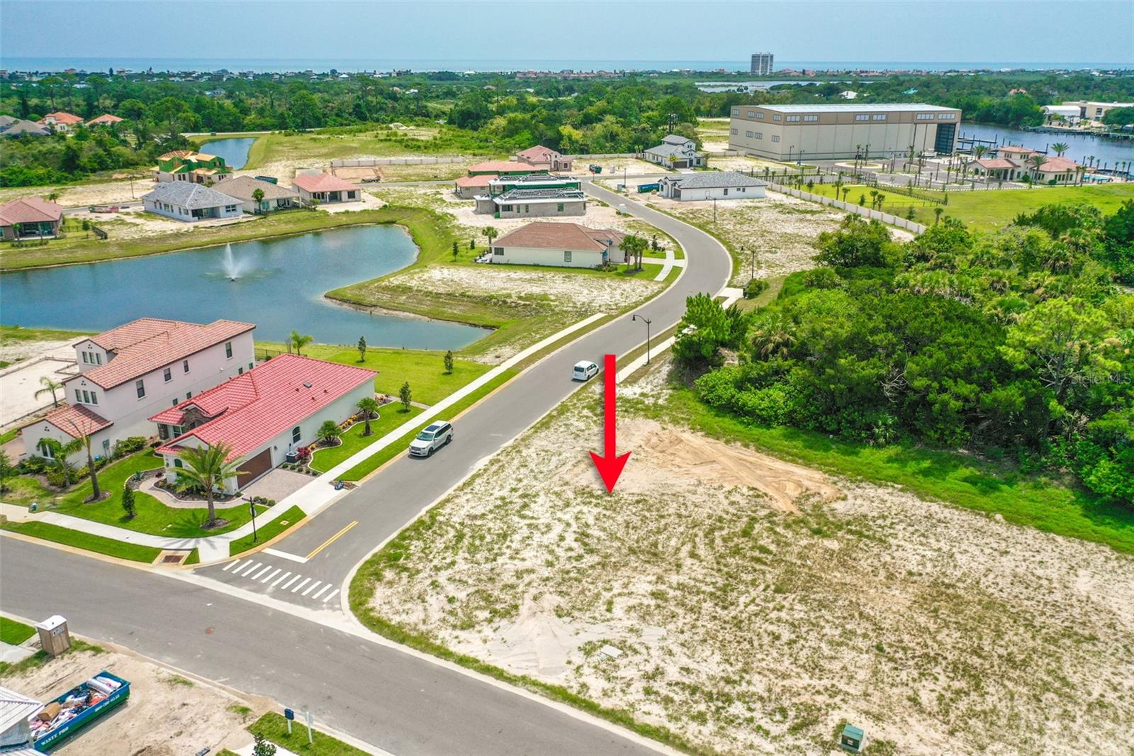 Build your dream home on this corner lot #56. PLANS AVAILABLE (see photos). Bring your boat, dog, family and friends! Join this premier yacht club community. This resort style neighborhood with intracoastal water access presents 113 acres and 154 single family homes. Each homesite is designated with one dry boat slip and the marina includes 83 wet boat slips. Current and future amenities include a gated entry, dockside clubhouse with pool, secure boat storage, valet boat service, traditional marina, dog park and more. Marina Del Palma is uniquely located for easy access to Flagler Beach and Palm Coast. Close to biking and walking trails, and shopping. This upscale community is ideal for the avid boater who enjoys hosting and convenient access to world famous Daytona Beach and historic St Augustine. Owner will consider seller financing.