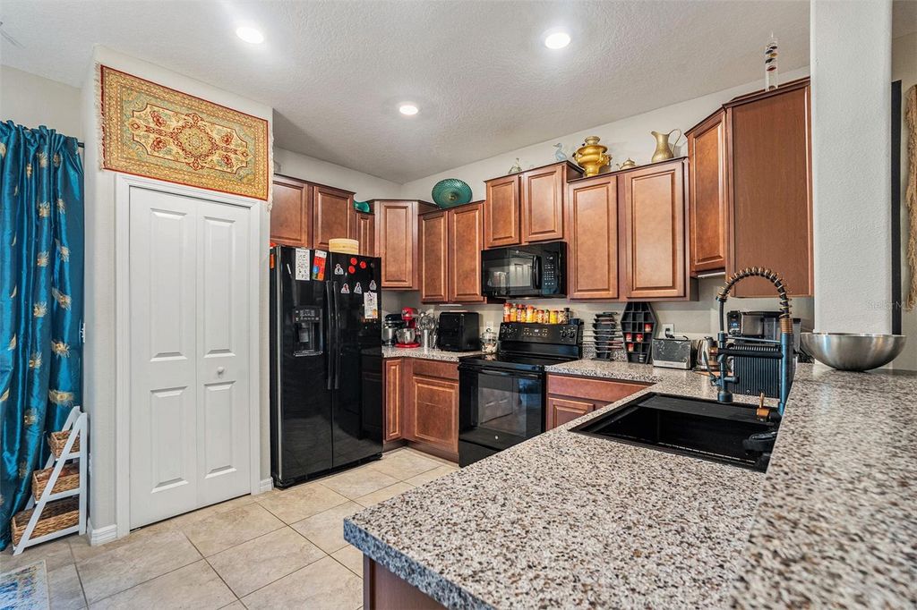 Photo of 4022 Wild Senna Boulevard, Tampa, FL 33619 (MLS # TB8447807)