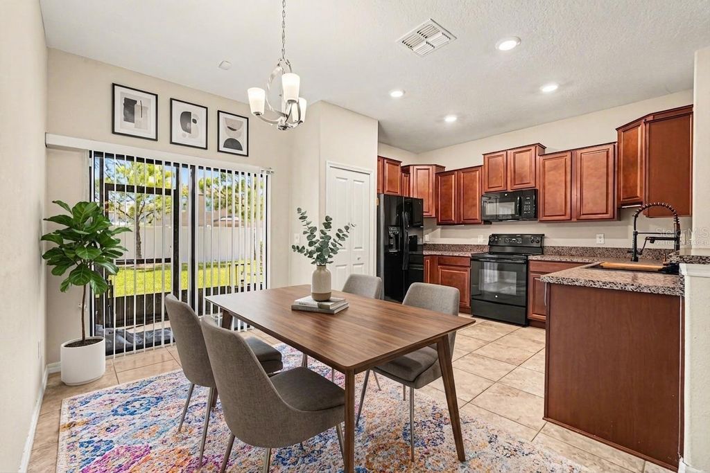 Photo of 4022 Wild Senna Boulevard, Tampa, FL 33619 (MLS # TB8447807)