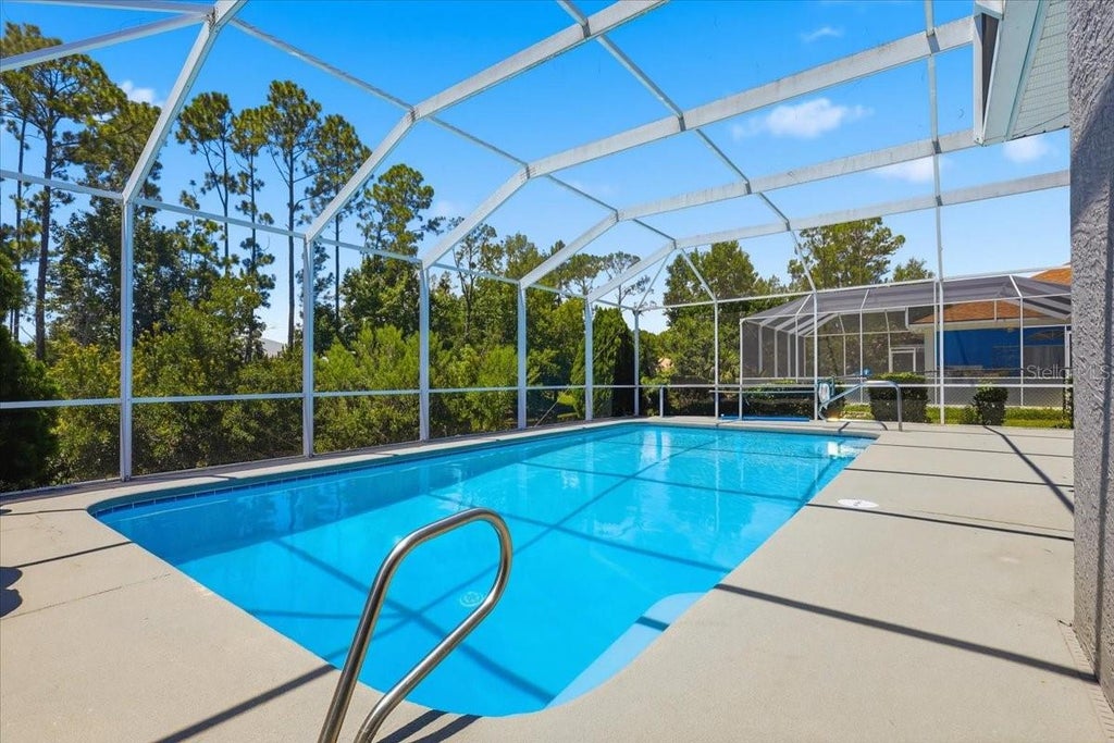 Photo of 56 Westbury Lane, Palm Coast, FL 32164 (MLS # FC320250)