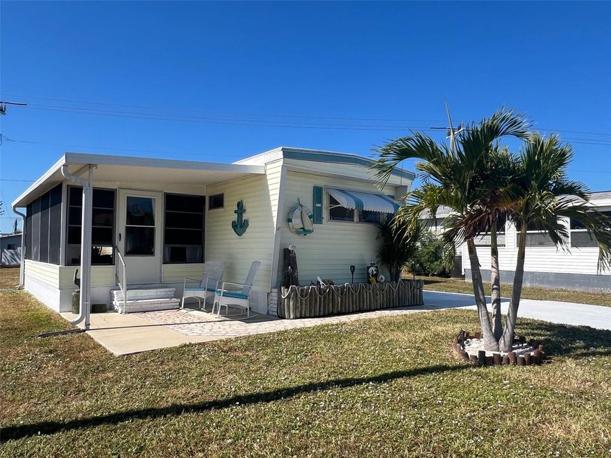Great opportunity to own an affordable home with coastal charm in a 55+ WATERFRONT COMMUNITY with Gulf access via the Myakka River. This well-maintained, thoughtfully decorated and FURNISHED home has 2 bedrooms and 2 bathrooms, a screened lanai plus an enclosed lanai adding valuable square footage for outdoor living and entertaining. This turn-key residence in the pet section, has been refreshed inside and has attractive newer furnishings and a comforting sense of "home". Plenty of updates have been completed in the last 5 years including a roof-over last year, new carport, electric panel, flooring, ceiling fans, Insta on-demand hot water heater, refrigerator and some new windows.  Outside find a very long driveway, additional storage space and the washer and dryer in the shed. A nice golf cart with batteries only 2 years old is included so you can cruise the neighborhood and enjoy wildlife sightings and tropical landscapes. The 2-story, 17,000 SF clubhouse overlooking the large marina is the perfect place for dances, trivia, card games, shows, picnics, classes, billiards and more. Amenities include 2 pools, a spa, fitness center, optional woodworking shop, bocce ball, shuffleboard, tennis, and pickleball. Boaters will love the option of renting a boat slip for only $100 per year to go fishing and explore the local waterways. Nearby are restaurants, shopping, golf courses, beaches and quality medical services. Whether you desire an active lifestyle, socializing and making new friends or just relaxing and taking in the scenery, Harbor Cove offers something for everyone. Schedule a private showing today to check it out for yourself!
