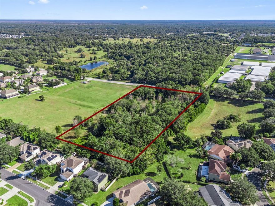 Outstanding development opportunity located within minutes of the Kelly Park / SR 429 growth corridor - one of Central Florida’s most active expansion areas. This 4.77-acre parcel is zoned RCE (Residential Country Estate) with Future Land Use allowing up to 3.5 units per acre and the ability to split once, offering flexibility for a small residential project, custom estates, or long-term investment hold.

Ideally positioned along Vick Road with utilities nearby and direct connectivity to SR 429, SR 441, and SR 46, the property is surrounded by ongoing residential and mixed-use development, including Kelly Park Crossings, the emerging Wyld Oaks community, and new single-family growth throughout the Kelly Park corridor. The area also benefits from expanding local healthcare services, retail, and commercial amenities supporting the region’s rapid population growth.

The land features mature trees and multiple potential build sites, making it an excellent opportunity for a builder, developer, or investor seeking acreage with strong demand indicators and future upside. No HOA. Minutes from Kelly Park, Wekiwa Springs, Rock Springs, shopping, dining, and additional area amenities.