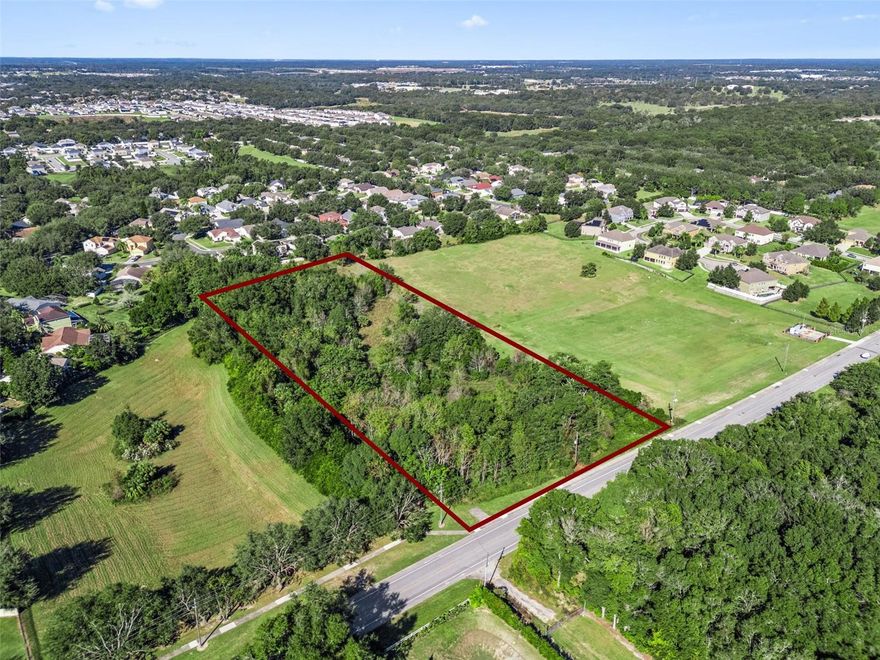 Outstanding development opportunity located within minutes of the Kelly Park / SR 429 growth corridor - one of Central Florida’s most active expansion areas. This 4.77-acre parcel is zoned RCE (Residential Country Estate) with Future Land Use allowing up to 3.5 units per acre and the ability to split once, offering flexibility for a small residential project, custom estates, or long-term investment hold.

Ideally positioned along Vick Road with utilities nearby and direct connectivity to SR 429, SR 441, and SR 46, the property is surrounded by ongoing residential and mixed-use development, including Kelly Park Crossings, the emerging Wyld Oaks community, and new single-family growth throughout the Kelly Park corridor. The area also benefits from expanding local healthcare services, retail, and commercial amenities supporting the region’s rapid population growth.

The land features mature trees and multiple potential build sites, making it an excellent opportunity for a builder, developer, or investor seeking acreage with strong demand indicators and future upside. No HOA. Minutes from Kelly Park, Wekiwa Springs, Rock Springs, shopping, dining, and additional area amenities.