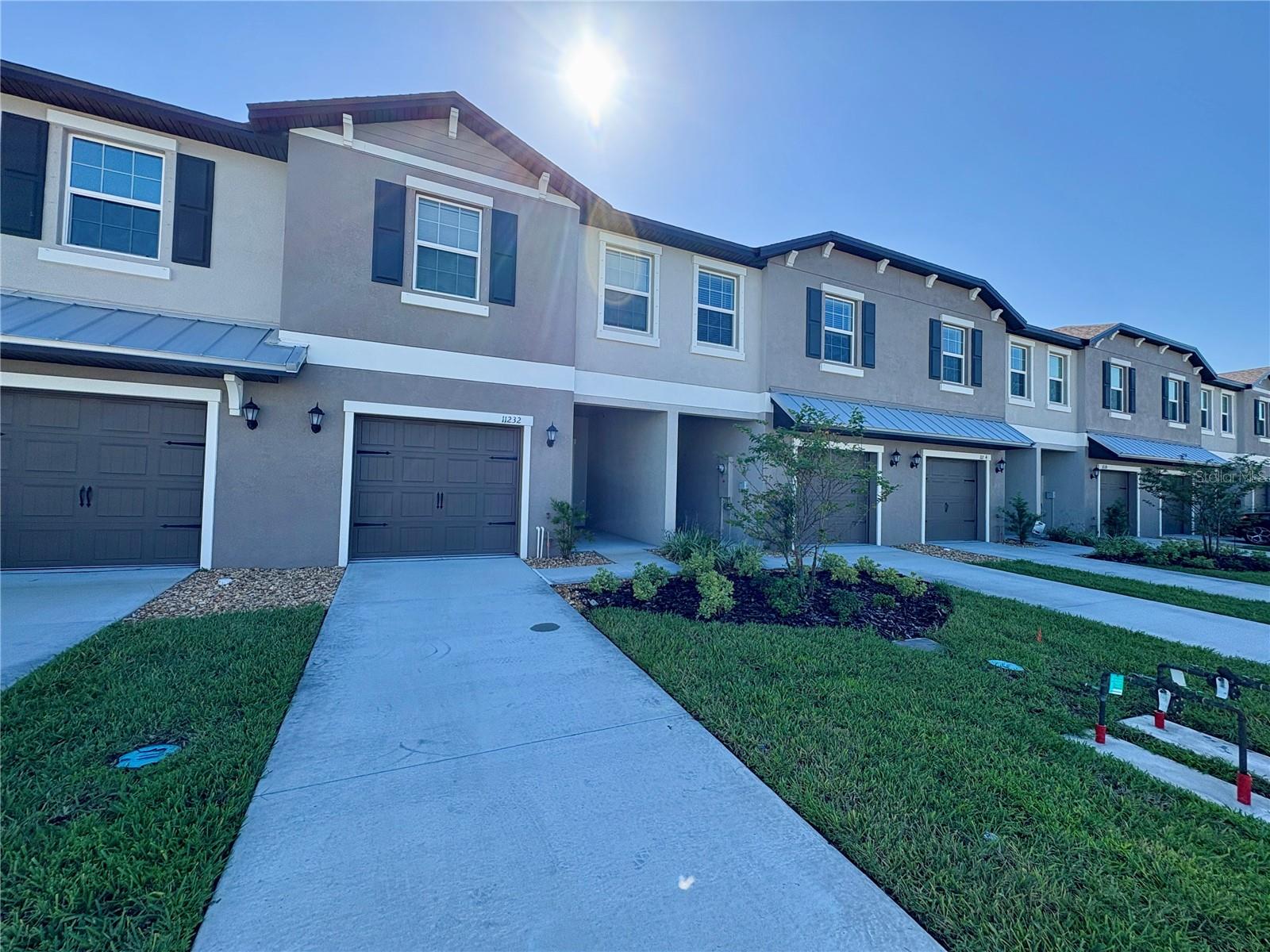 For Rent! Available for immediate move-in! Pet friendly! Welcome home to this brand new spacious and modern 3-bedroom, 2.5-bathroom townhome in the desirable Palmetto area! Perfectly designed for both comfort and function, this two-story home offers a versatile layout and thoughtful upgrades throughout. Step inside to find an open-concept main floor with a bright living and dining area that flows seamlessly into the kitchen. The kitchen features stainless steel appliances, ample cabinetry, and a breakfast bar—ideal for both entertaining and everyday meals. A convenient half bathroom is also located on the first floor. Upstairs, you’ll love the additional living space provided by the loft area, which is perfect for a home office, media room, or play area. The primary suite includes a large walk-in closet and ensuite bath, while two additional bedrooms share a full guest bathroom, offering plenty of space for family or guests. Enjoy outdoor living with your private patio that is soon to be screened-in and take advantage of the community’s convenient location with easy access to shopping, dining, and I-75 for commuting to Sarasota, Bradenton, St. Pete, or Tampa. Washer & Dryer included with unit. Maintenance free with lawn care, irrigation, and basic internet included!