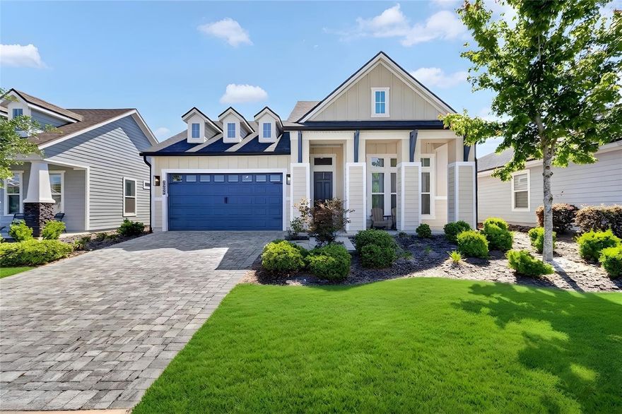 One or more photo(s) has been virtually staged. Don’t miss this exceptional opportunity to experience in the highly sought-after Oakmont community—one of Gainesville’s premier resort-style neighborhoods. Built in 2022, this beautifully appointed 3-bedroom, 2-bath residence with a dedicated bonus/office den offers the perfect blend of modern design, comfort, and elevated outdoor living.

Inside, you’ll find a thoughtfully designed split-bedroom floor plan featuring a spacious owner’s suite with a generous walk-in closet and a beautifully finished en-suite bath showcasing a walk-in shower and elegant finishes. The additional bedrooms provide comfort and privacy, while the versatile bonus/office den offers ample space for a fully equipped home office or flex space tailored to your lifestyle.

The heart of the home showcases an open-concept layout where the kitchen, dining, and living areas flow seamlessly together, creating an inviting space ideal for both everyday living and entertaining. Step outside to a large covered lanai designed for effortless outdoor enjoyment. The backyard has been enhanced with stylish pavers, easy-maintenance landscaping, and a built-in 6-person Jacuzzi/spa, creating a private retreat that perfectly balances relaxation and resort-style living. A fully fenced yard adds both privacy and convenience.

Residents of Oakmont enjoy access to an impressive array of resort-style amenities, including a spectacular pool, fitness center, pickleball and tennis courts, scenic walking trails, and beautifully maintained community spaces designed for connection and recreation.

Ideally located just minutes from the University of Florida, UF Health, the VA, I-75, premier shopping, dining, and entertainment, this home offers the perfect combination of luxury, convenience, and lifestyle.

Schedule your private VIP showing today and experience Oakmont living at its finest.