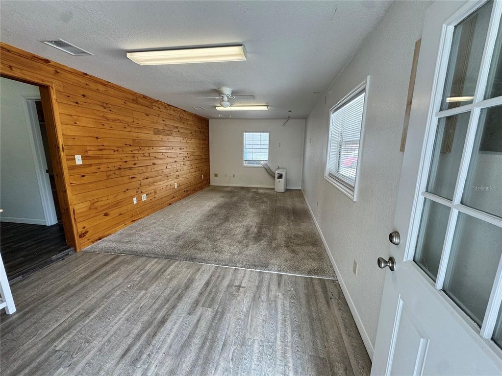 Photo of 306 N Iona Avenue, Fruitland Park, FL 34731 (MLS # G5109491)