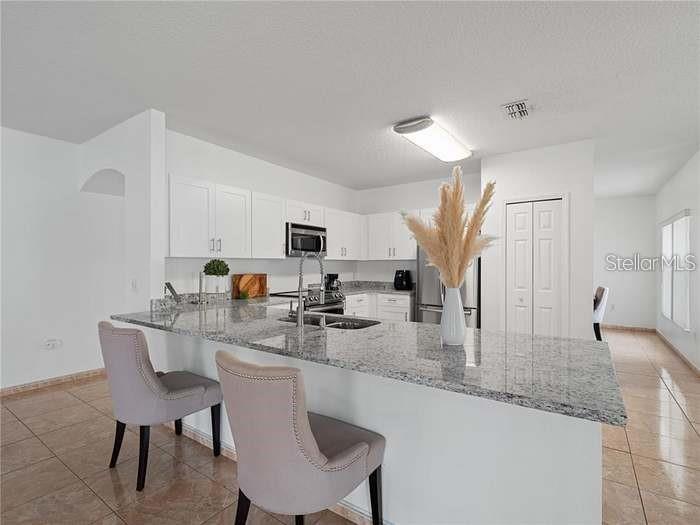 TAMARIND PARKE AT CYPRESS WOODS UNIT 2 - Residential Lease