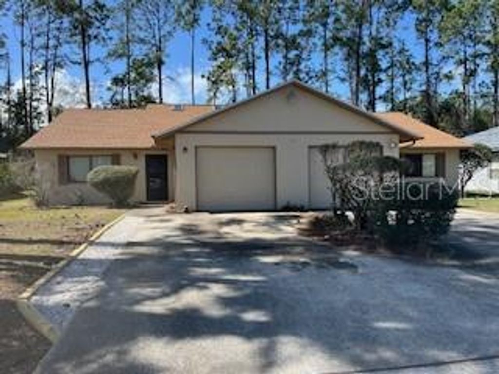 Photo of 59 Wellwood Lane, Palm Coast, FL 32137 (MLS # FC317405)