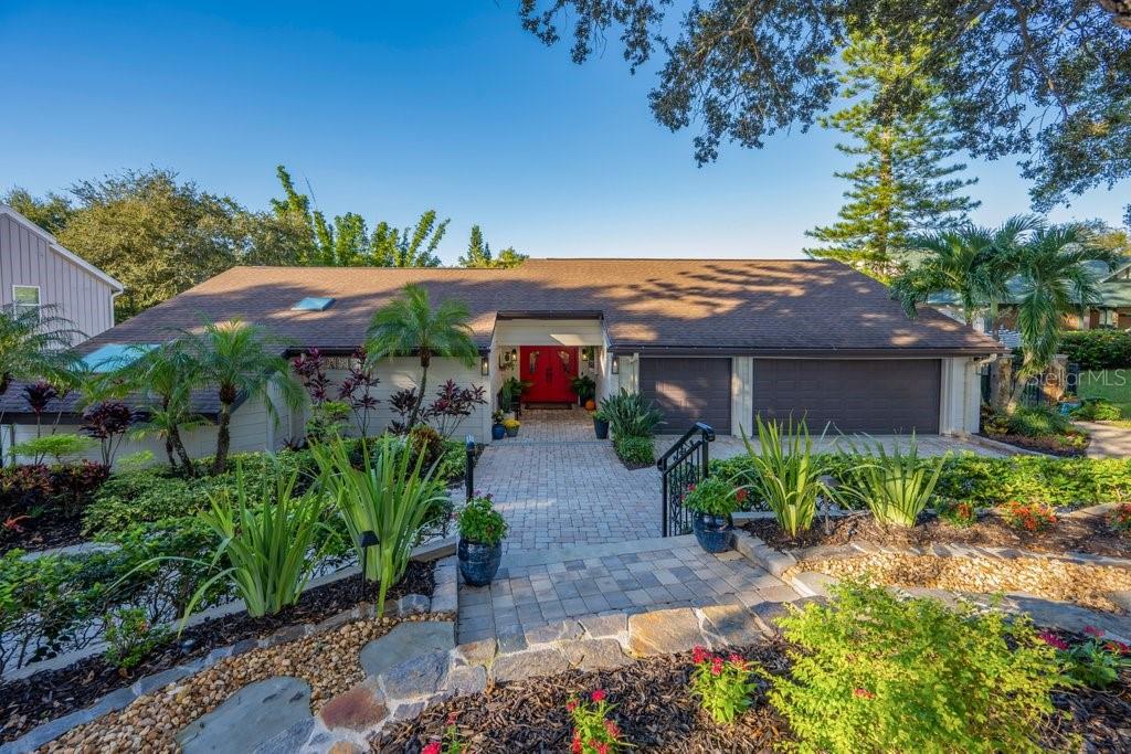 Photo of 1184 Weybridge Lane, Dunedin, FL 34698 (MLS # TB8560742)