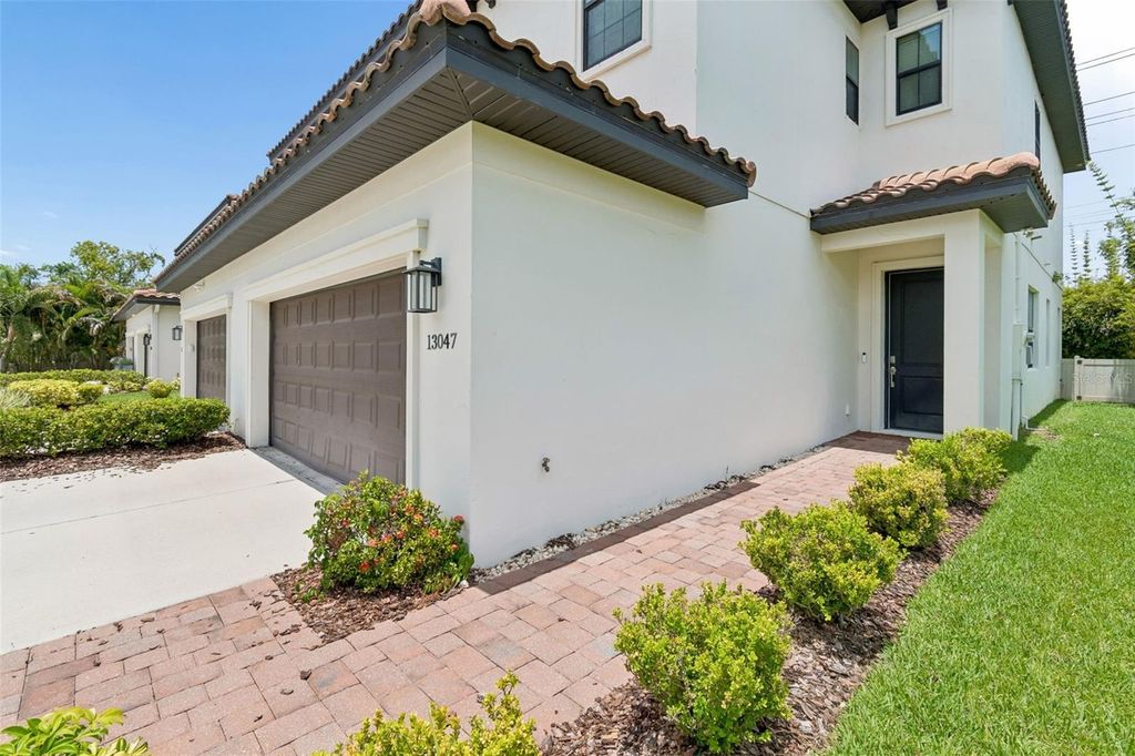 Photo of 13047 Sanctuary Village Lane, Tampa, FL 33624 (MLS # TB8510538)