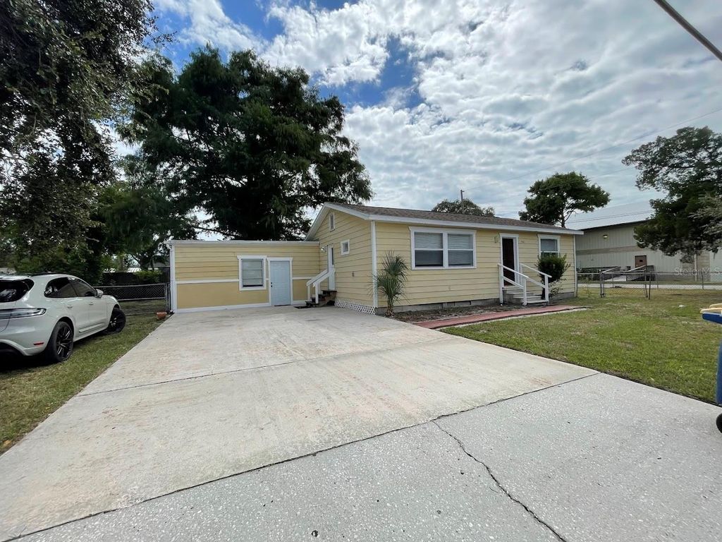 Photo of 901 Woodlawn Street, Clearwater, FL 33756 (MLS # TB8435654)
