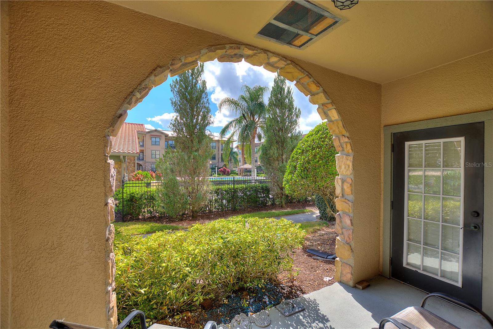 Enjoy Mediterranean Resort-style living every day with this beautiful 3 bedrooms, 3 baths, fully furnished, first-floor condo at Bella Piazza. This
first-floor walkout is just steps away from the pool! Bella Piazza features 3 pools, and hot tub spa, fitness, and
business center. This beautifully upgraded unit includes newer appliances (fridge, double oven, dishwasher, and full-size stackable washer/dryer)
the HVAC handler and compressor have also been replaced (2018), hot water heater (2018). The kitchen also features 42" wood cabinets,
granite countertops, and 17" ceramic tiles and crown molding throughout the open concept dining/living room. At Bella Piazza you are within
walking distance from Publix for easy trips to the grocery store and several restaurants. Easy access to
highways (I-4 and 192), just 8 miles to the happiest place on earth (Walt Disney
World!!!) Which makes this unit the perfect full-time residence, second home for a snowbird, or a short-term rental for an investor looking for an Airbnb property.