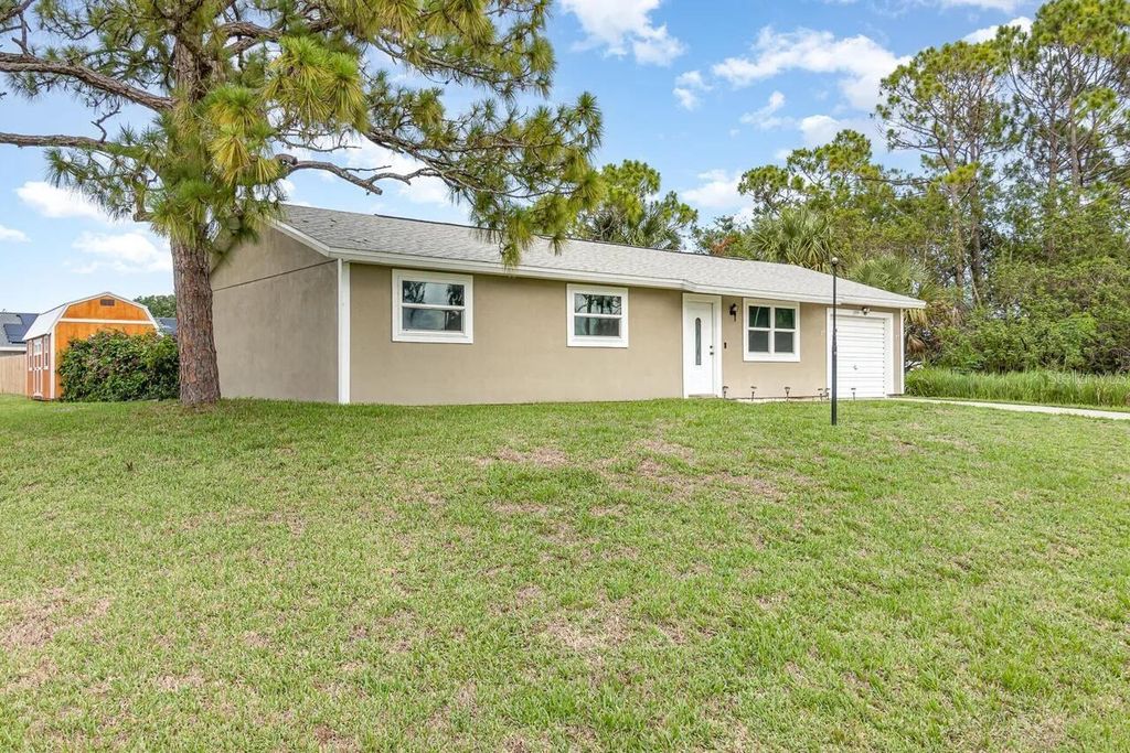 Photo of 1399 Helliwell Street NW, Palm Bay, FL 32907 (MLS # O6369973)
