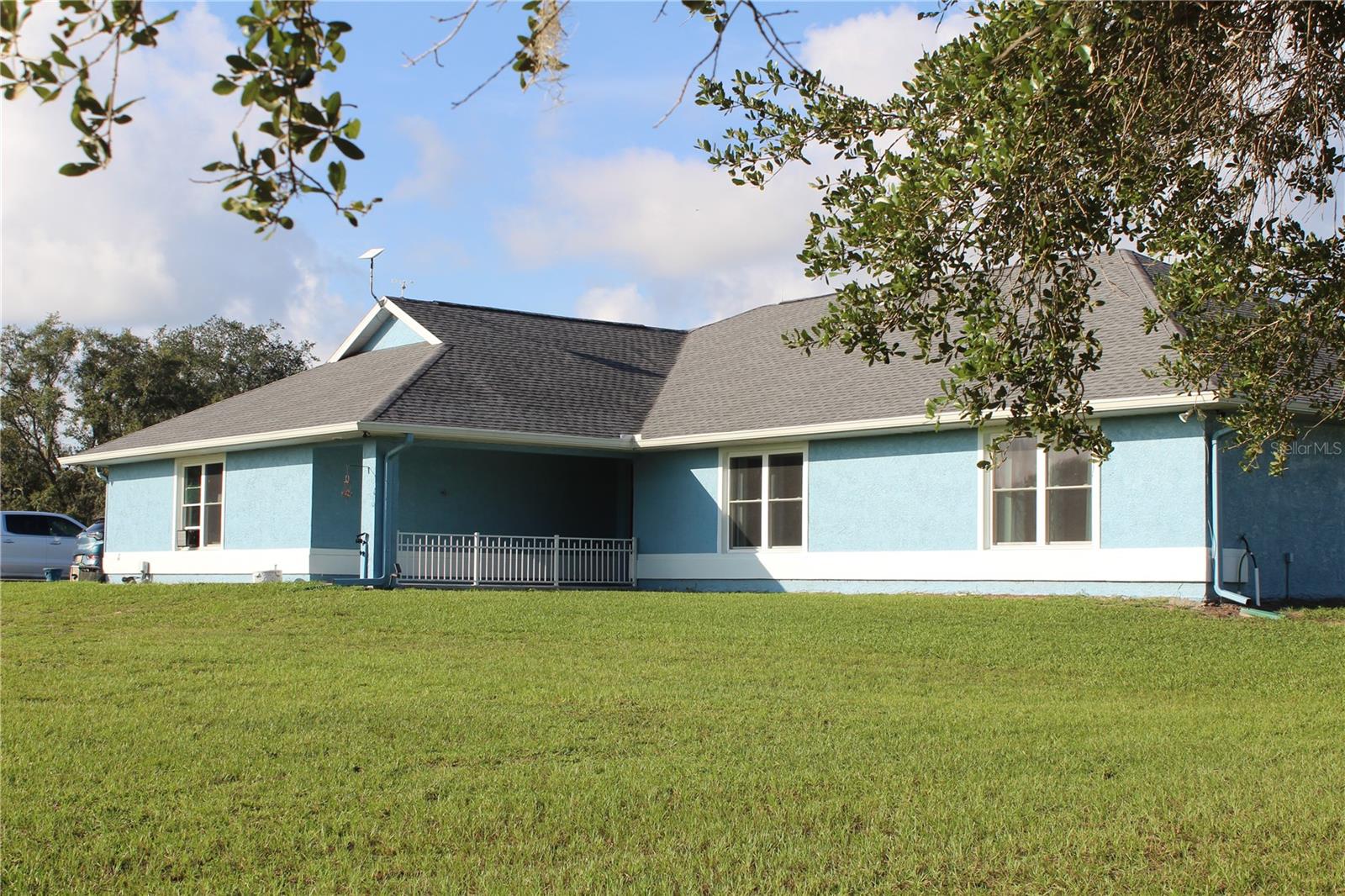 Beautiful 14.91 acre Ranch Retreat with Pool, Barn, and 10 paddocks. Tucked away at the end of a quiet cul-de-sac in a private neighborhood, this beautifully maintained ranch-style home offers over 2100 sq ft of comfort, functionality, and Florida Charm. Located minutes from Dunnellon, Ocala, and the sought after World Equestrian Center. Inside, the home features 3Bed/2Bath, spacious living room and family room. an additional bonus room with AC. Ideal for a game room, personal gym, or home office. A wood burning fireplace adds even more charm. Newer windows throughout the home bring in natural light and energy efficiency. ADT security throughout. Roof is only 4 years old. Eco-conscious buyers will appreciate the solar powered utilities to help reduce monthly bills while keeping the home running efficiently. Step outside to your personal oasis- a heated, screen-enclosed pool with a built in sunshelf and attached hot tub, perfect for unwinding and entertaining year round. The property is fully fenced and cross-fenced, complete with remote controlled gated entrance. Solid concrete block, 3 stall barn with concrete pad and turn out. Plenty of room for all the animals. The barn boasts plenty of room for storage. Additional outbuildings, sheds and carports for your all your needs. Enjoy the serenity of nature with the convenience of being just minutes from town. The property boasts beautiful Oak trees which provides plenty of shade. This rare gem offers the perfect blend of privacy, comfort, and lifestyle. Schedule a tour today.