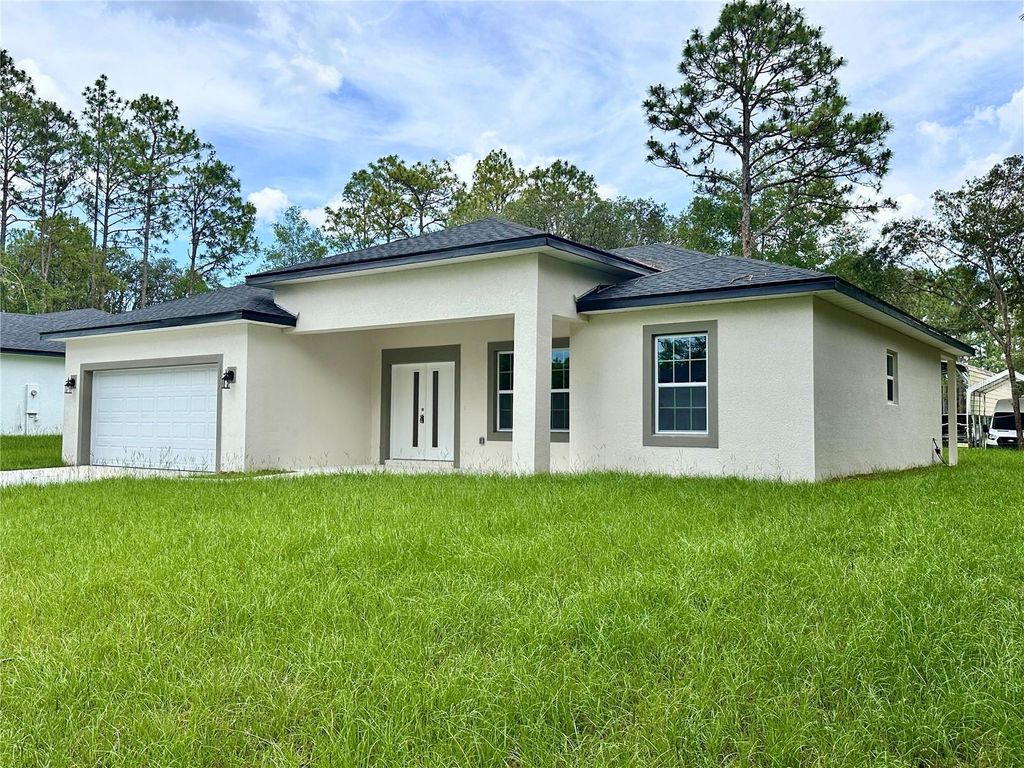 Photo of 7977 N Pocono Drive, Citrus Springs, FL 34434 (MLS # O6319732)