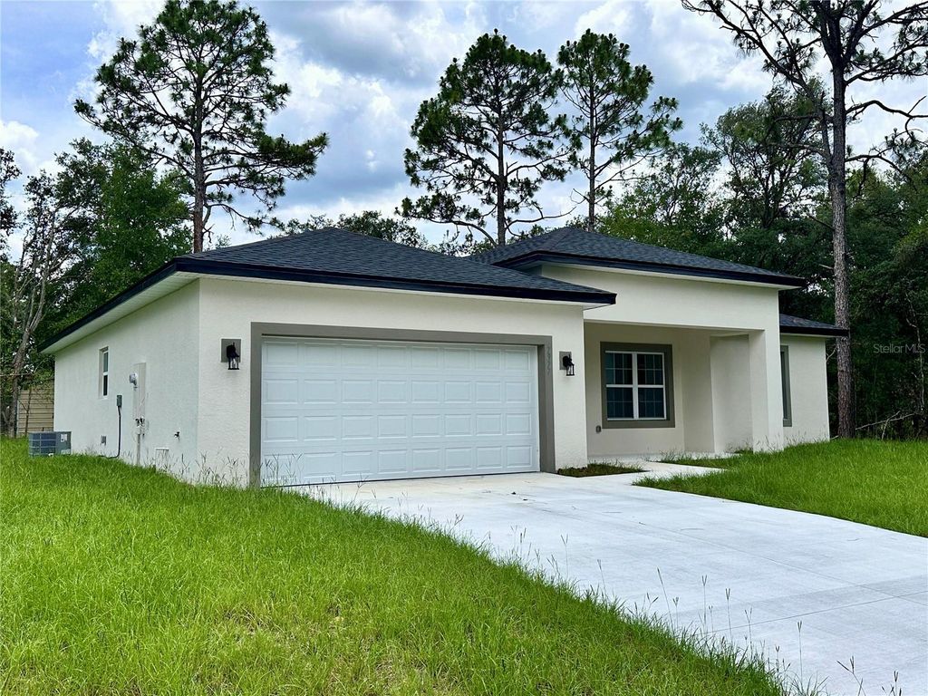Photo of 7977 N Pocono Drive, Citrus Springs, FL 34434 (MLS # O6319732)